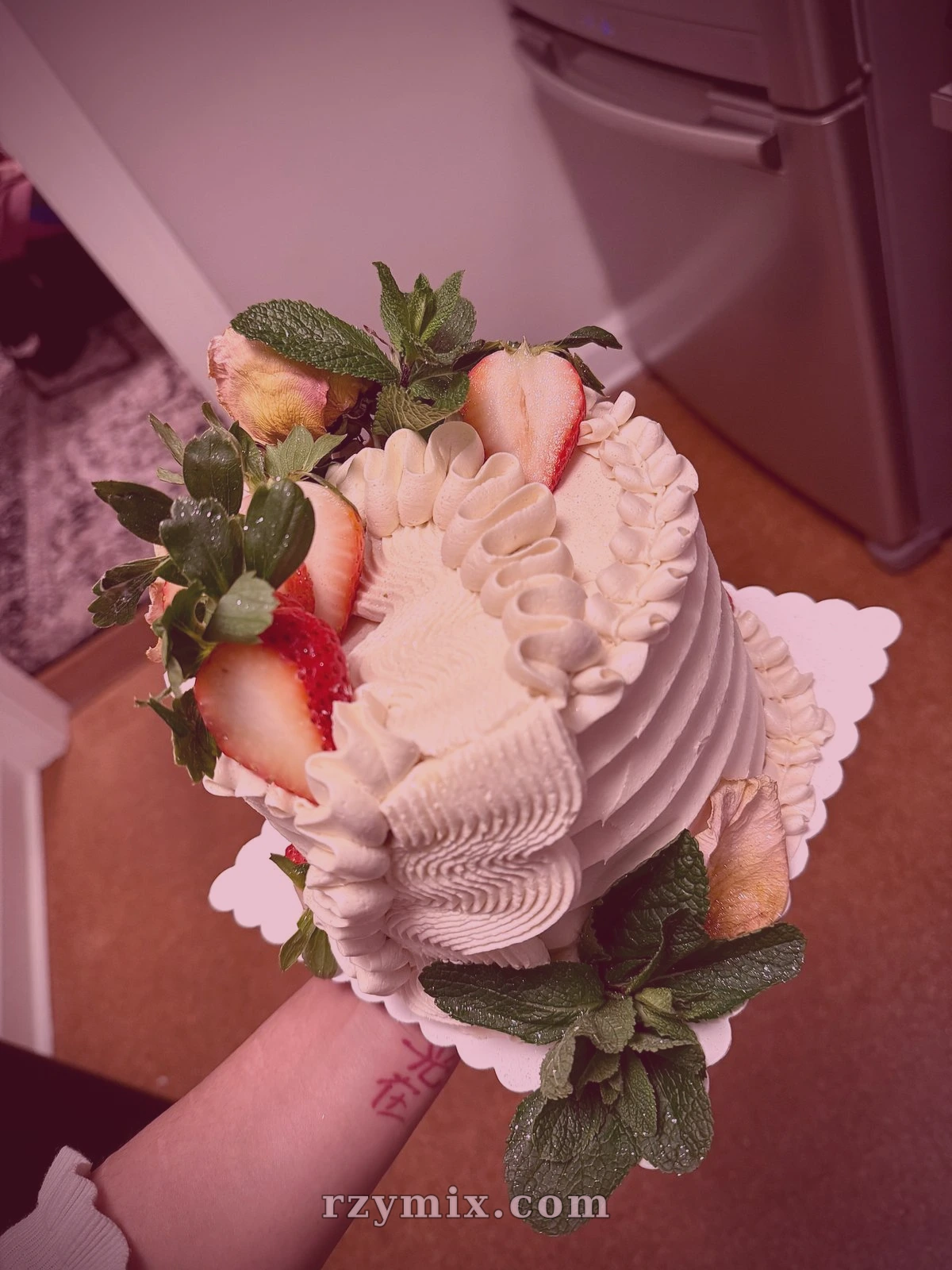 earl gray cake soaked with strawberry syrup, filled with fresh strawberries and frosted with cream cheese buttercream (vg)