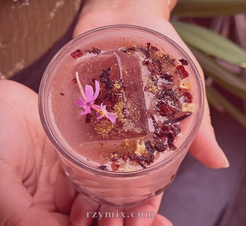 pushpa hibiscus chai with elderflower liquor